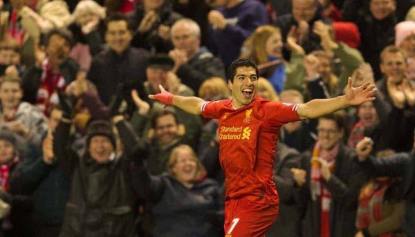 LIVERPOOL, ENGLAND - Wednesday, December 4, 2013: Liverpool's Luis Suarez celebrates scoring the first goal against Norwich City during the Premiership match at Anfield. (Pic by David Rawcliffe/Propaganda)