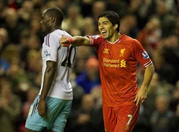 LIVERPOOL, ENGLAND - Saturday, December 7, 2013: Liverpool's Luis Suarez celebrates scoring the third goal against West Ham United during the Premiership match at Anfield. (Pic by David Rawcliffe/Propaganda)