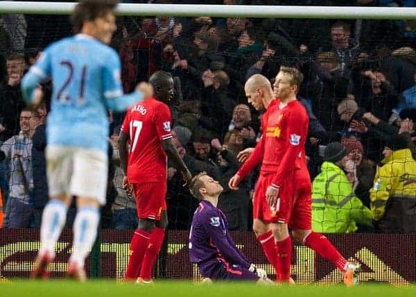 MANCHESTER, ENGLAND - Boxing Day Thursday, December 26, 2013: Liverpool's goalkeeper Simon Mignolet looks dejected as Manchester City score the second goal to make the score 2-1 during the Premiership match at the City of Manchester Stadium. (Pic by David Rawcliffe/Propaganda)