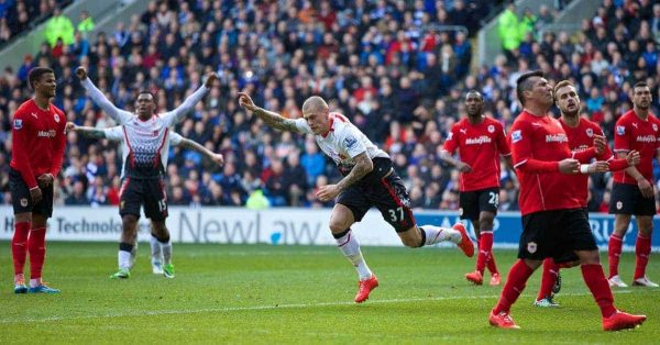 CARDIFF, WALES - Saturday, March 22, 2014: Liverpool's Martin Skrtel celebrates scoring the second goal against Cardiff City during the Premiership match at the Cardiff City Stadium. (Pic by David Rawcliffe/Propaganda)