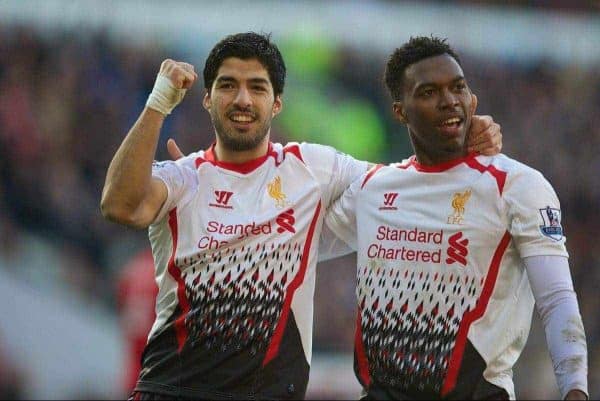 CARDIFF, WALES - Saturday, March 22, 2014: Liverpool's Daniel Sturridge celebrates scoring the fith goal against Cardiff City with team-mate Luis Suarez during the Premiership match at the Cardiff City Stadium. (Pic by David Rawcliffe/Propaganda)