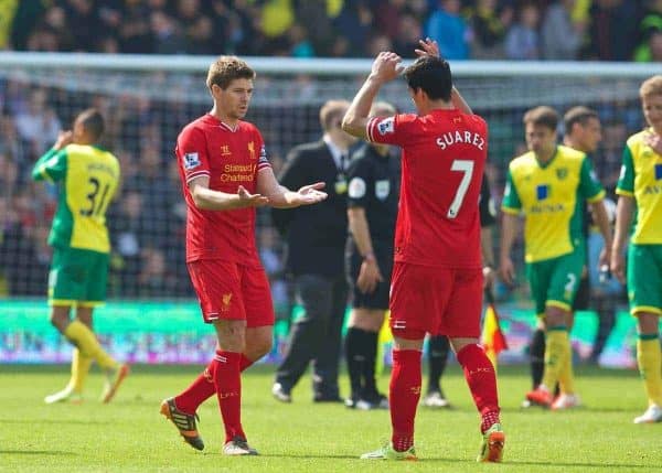 NORWICH, ENGLAND - Sunday, April 20, 2014: Liverpool's captain Steven Gerrard and Luis Suarez celebrate their side's 3-2 victory over Norwich City during the Premiership match at Carrow Road. (Pic by David Rawcliffe/Propaganda)