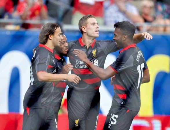 CHICAGO, USA - Sunday, July 27, 2014: Liverpool's Raheem Sterling celebrates scoring the first goal against Olympiacos2 with team-mates Lazar Markovic, Jordan Henderson and Daniel Sturridge during the International Champions Cup Group B match at the Soldier Field Stadium on day seven of the club's USA Tour. (Pic by David Rawcliffe/Propaganda)