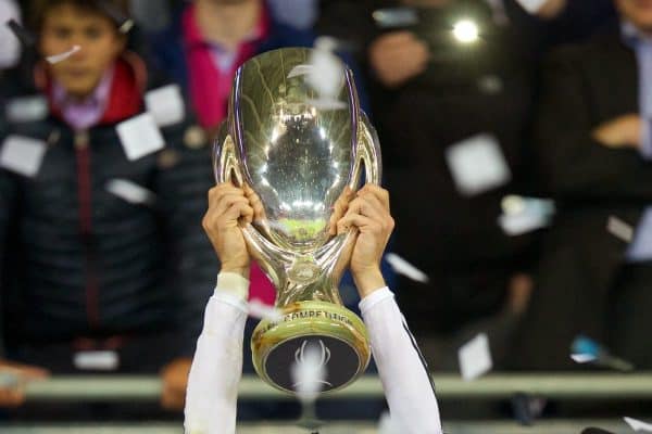 CARDIFF, WALES - Tuesday, August 12, 2014: Real Madrid's Gareth Bale lifts the trophy after his side's 2-0 victory over Sevilla during the UEFA Super Cup at the Cardiff City Stadium. (Pic by David Rawcliffe/Propaganda)