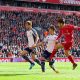 LIVERPOOL, ENGLAND - Saturday, October 4, 2014: Liverpool's Adam Lallana scores the first goal against West Bromwich Albion during the Premier League match at Anfield. (Pic by David Rawcliffe/Propaganda)