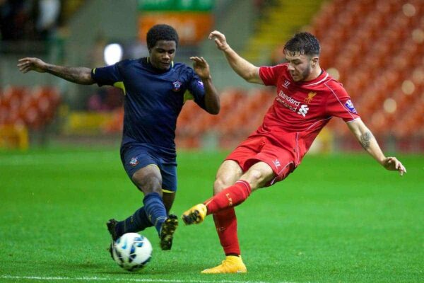 ANFIELD, ENGLAND - Thursday, October 16, 2014: Liverpool's Joe Maguire in action against Southampton's Omar Rowe during the Under 21 FA Premier League match at Anfield. (Pic by David Rawcliffe/Propaganda)