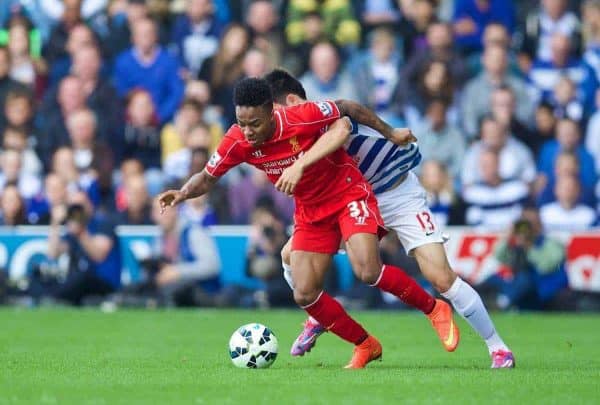 LONDON, ENGLAND - Sunday, October 19, 2014: Liverpool's Raheem Sterling in action against Queens Park Rangers' Yun Suk-Young during the Premier League match at Loftus Road. (Pic by David Rawcliffe/Propaganda)