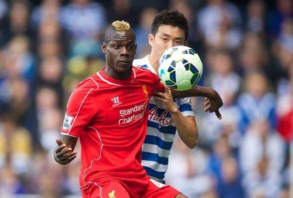 LONDON, ENGLAND - Sunday, October 19, 2014: Liverpool's Mario Balotelli in action against Queens Park Rangers' Yun Suk-Young during the Premier League match at Loftus Road. (Pic by David Rawcliffe/Propaganda)