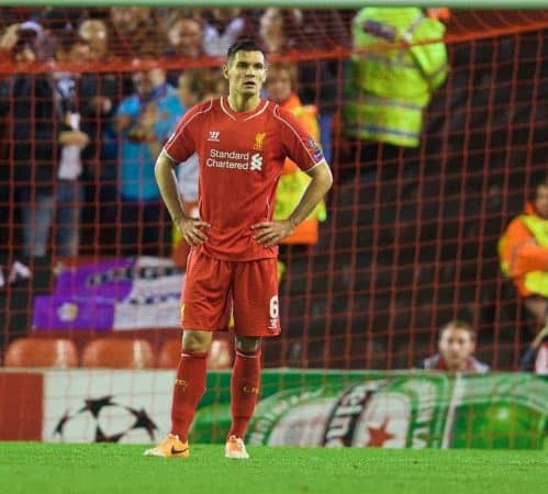 LIVERPOOL, ENGLAND - Wednesday, October 22, 2014: Liverpool's Dejan Lovren looks dejected as Real Madrid CF score the third goal during the UEFA Champions League Group B match at Anfield. (Pic by David Rawcliffe/Propaganda)