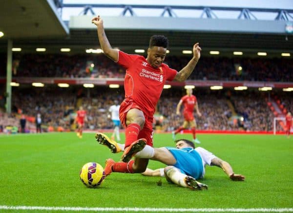 LIVERPOOL, ENGLAND - Saturday, October 25, 2014: Liverpool's Raheem Sterling in action against Hull City's Robbie Brady during the Premier League match at Anfield. (Pic by David Rawcliffe/Propaganda)