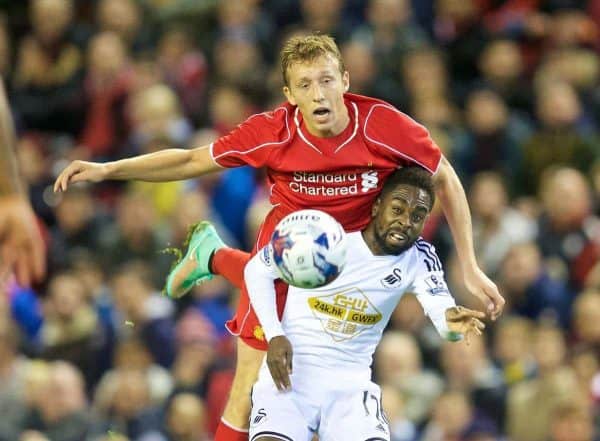 LIVERPOOL, ENGLAND - Tuesday, October 28, 2014: Liverpool's Lucas Leiva in action against Swansea City's Nathan Dyer during the Football League Cup 4th Round match at Anfield. (Pic by David Rawcliffe/Propaganda)