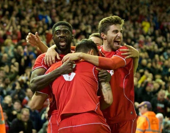 LIVERPOOL, ENGLAND - Tuesday, October 28, 2014: Liverpool's Dejan Lovren celebrates scoring the second goal against Swansea City in injury time during the Football League Cup 4th Round match at Anfield. (Pic by David Rawcliffe/Propaganda)