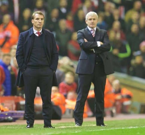 LIVERPOOL, ENGLAND - Saturday, November 29, 2014: Liverpool's manager Brendan Rodgers and Stoke City's manager Mark Hughes during the Premier League match at Anfield. (Pic by David Rawcliffe/Propaganda)