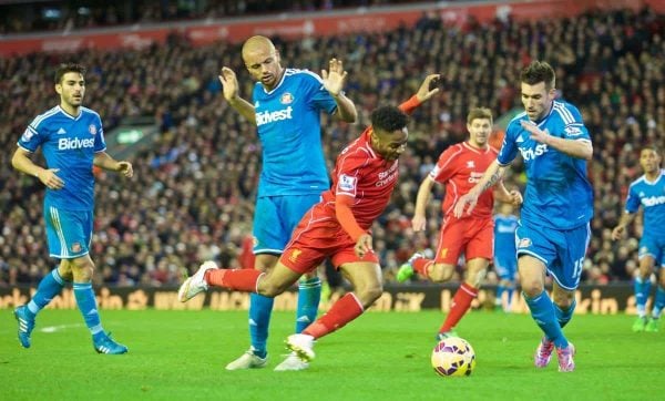 LIVERPOOL, ENGLAND - Saturday, December 6, 2014: Liverpool's Raheem Sterling is fouled in the area by Sunderland's Wes Brown but no penalty was given during the Premier League match at Anfield. (Pic by David Rawcliffe/Propaganda)