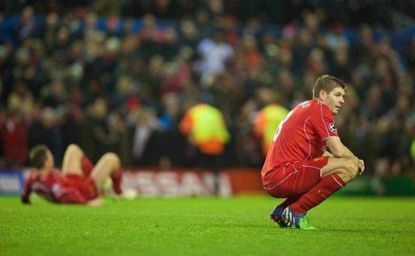 LIVERPOOL, ENGLAND - Tuesday, December 9, 2014: Liverpool's captain Steven Gerrard looks dejected as they draw 1-1 with FC Basel and are knocked out of the UEFA Champions League and are forced to suffer the ignominy of the Europa League at Anfield. (Pic by David Rawcliffe/Propaganda)