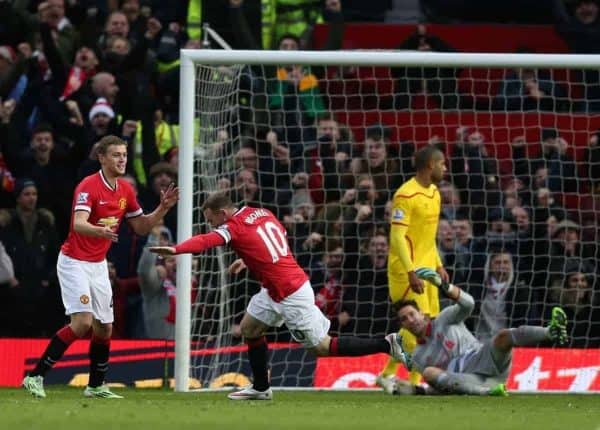 MANCHESTER, ENGLAND - Sunday, December 14, 2014: Liverpool's goalkeeper Brad Jones looks dejected as Manchester United's Wayne Rooney scores the opening goal during the Premier League match at Old Trafford. (Pic by David Rawcliffe/Propaganda)