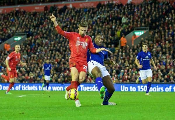 LIVERPOOL, ENGLAND - Thursday, New Year's Day, January 1, 2015: Liverpool's Fabio Borini is brought down by Leicester City's captain Wes Morgan but no penalty was awarded during the Premier League match at Anfield. (Pic by David Rawcliffe/Propaganda)