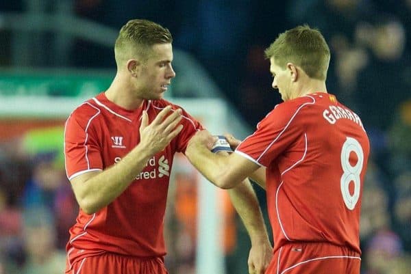 LIVERPOOL, ENGLAND - Tuesday, January 20, 2015: Liverpool's captain Steven Gerrard hands the armband to Jordan Henderson as he is substituted against Chelsea during the Football League Cup Semi-Final 1st Leg match at Anfield. (Pic by David Rawcliffe/Propaganda)