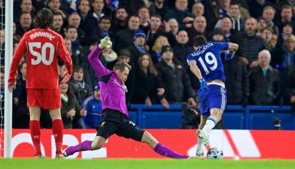 LONDON, ENGLAND - Tuesday, January 27, 2015: Liverpool's goalkeeper Simon Mignolet makes a save against Chelsea's Diego Costa during the Football League Cup Semi-Final 2nd Leg match at Stamford Bridge. (Pic by David Rawcliffe/Propaganda)