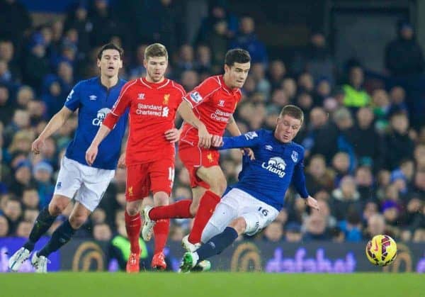 LIVERPOOL, ENGLAND - Friday, February 6, 2015: Liverpool's Philippe Coutinho Correia is fouled by Everton's James McCarthy, who was shown a yellow card for the challenge, during the Premier League match at Goodison Park, the 224th Merseyside Derby. (Pic by David Rawcliffe/Propaganda)