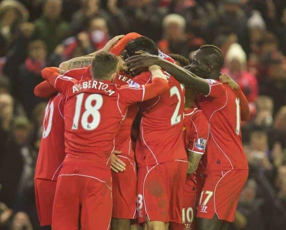 LIVERPOOL, ENGLAND - Tuesday, February 10, 2015: Liverpool's Mario Balotelli [hidden] celebrates scoring the third goal against Tottenham Hotspur with team-mates during the Premier League match at Anfield. (Pic by David Rawcliffe/Propaganda)