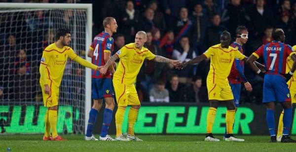 LONDON, ENGLAND - Saturday, February 14, 2015: Liverpool's Emre Can, Martin Skrtel and Mamadou Sakho hold hands against Crystal Palace during the FA Cup 5th Round match at Selhurst Park. (Pic by David Rawcliffe/Propaganda)