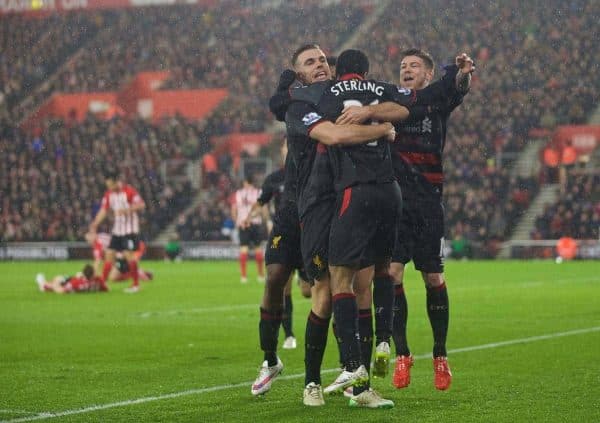 SOUTHAMPTON, ENGLAND - Sunday, February 22, 2015: Liverpool's Raheem Sterling celebrates scoring the second goal against Southampton with team-mates Jordan Henderson and Alberto Moreno during the FA Premier League match at St Mary's Stadium. (Pic by David Rawcliffe/Propaganda)