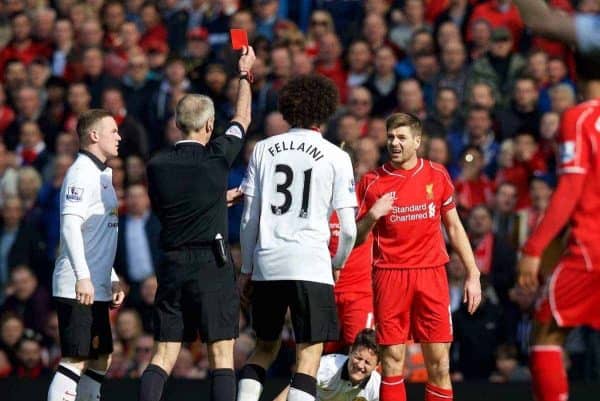 LIVERPOOL, ENGLAND - Sunday, March 22, 2015: Liverpool's captain Steven Gerrard reacts after being fouled by Manchester United's Ander Herrera, but is amazingly shown the red card by referee Martin Atkinson during the Premier League match at Anfield. (Pic by David Rawcliffe/Propaganda)