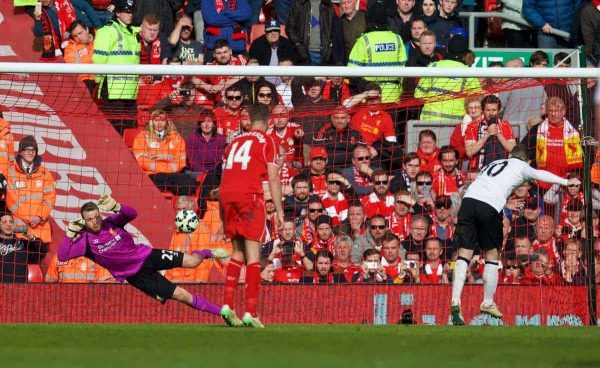 LIVERPOOL, ENGLAND - Sunday, March 22, 2015: Liverpool's goalkeeper Simon Mignolet saves a penalty kick from Manchester United's Wayne Rooney during the Premier League match at Anfield. (Pic by David Rawcliffe/Propaganda)