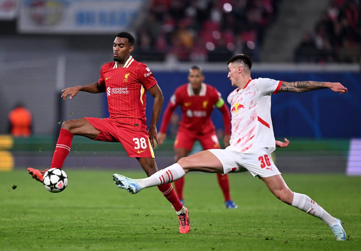 LEIPZIG, GERMANY - OCTOBER 23: Ryan Gravenberch of Liverpool reacts to Benjamin of RB Leipzig during the UEFA Champions League 2024/25 league third stage match between RB Leipzig and Liverpool FC at Leipzig Stadium on October 23, 2024. Controlling the ball while under pressure from Sesco. Leipzig, Germany. (Photo: Oliver Hardt - UEFA/UEFA via Getty Images)