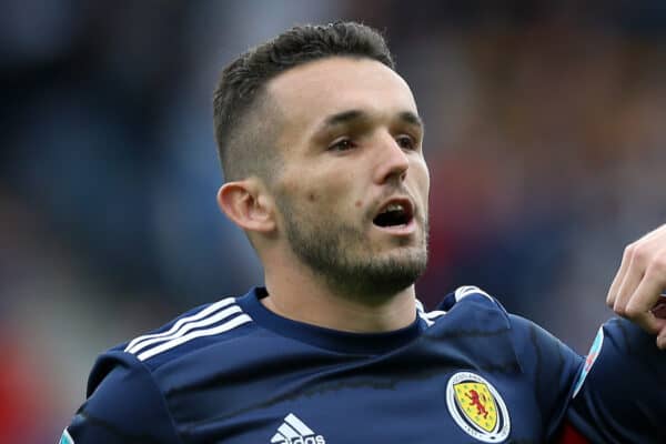 GLASGOW, SCOTLAND - JUNE 14: (L - R) John McGinn, Lyndon Dykes and Jack Hendry of Scotland sing the national anthem prior to the UEFA Euro 2020 Championship Group D match between Scotland v Czech Republic at Hampden Park on June 14, 2021 in Glasgow, Scotland. (Photo by Steve Bardens - UEFA/UEFA via Getty Images)