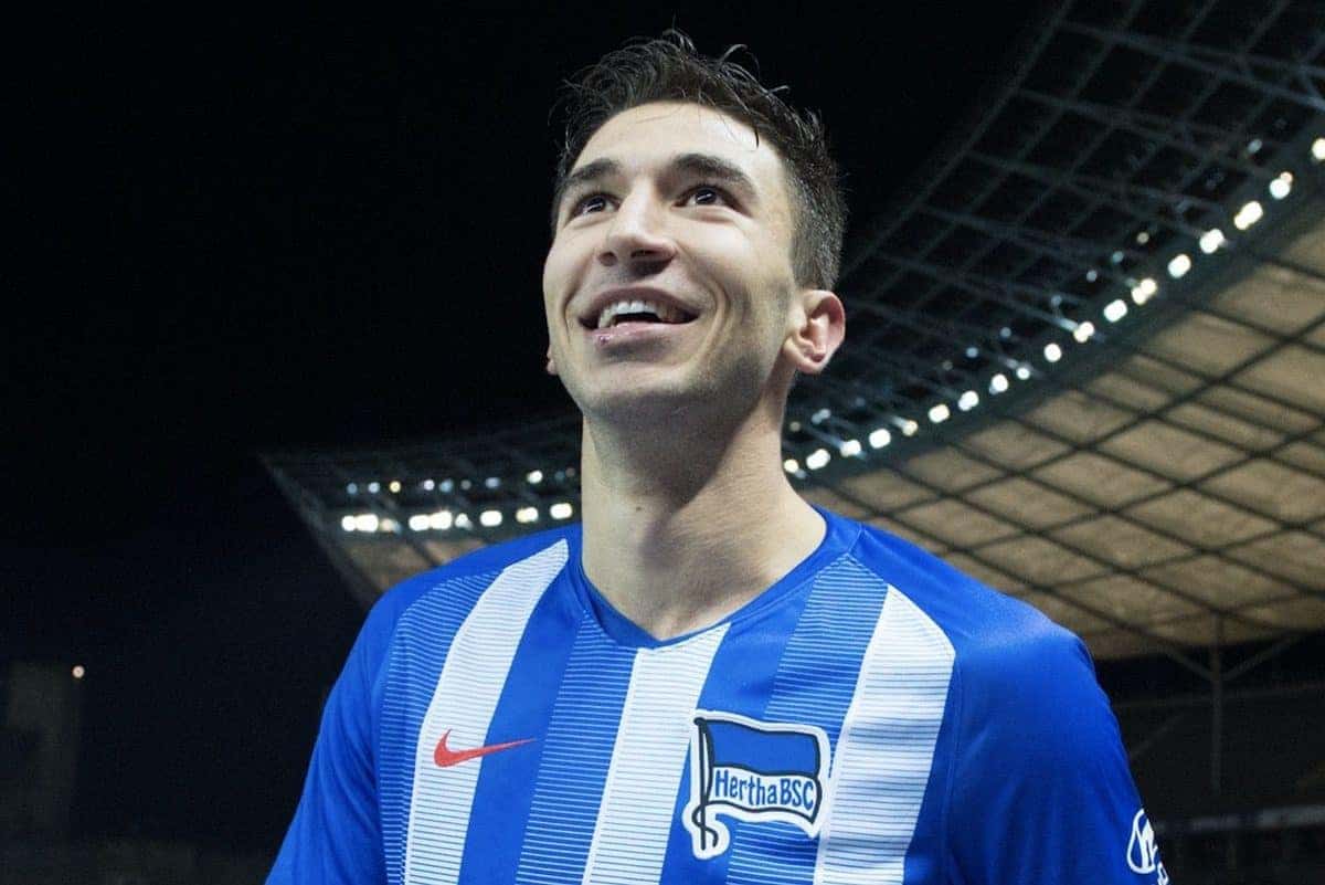 08 December 2018, Berlin: 08.12.2018, Berlin: Soccer, 1st Bundesliga, 14th matchday, Hertha BSC Berlin - SG Eintracht Frankfurt in the Olympic Stadium. After the end of the game Berlin's goal scorer Marko Grujic runs laughing towards the east bend. Photo: Annegret Hilse/dpa - IMPORTANT NOTE: In accordance with the requirements of the DFL Deutsche Fu?ball Liga or the DFB Deutscher Fu?ball-Bund, it is prohibited to use or have used photographs taken in the stadium and/or the match in the form of sequence images and/or video-like photo sequences.