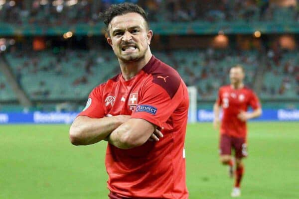 Xherdan Shaqiri celebrates scoring his side’s third goal against Turkey in Baku (Ozan Kose/Pool via AP)