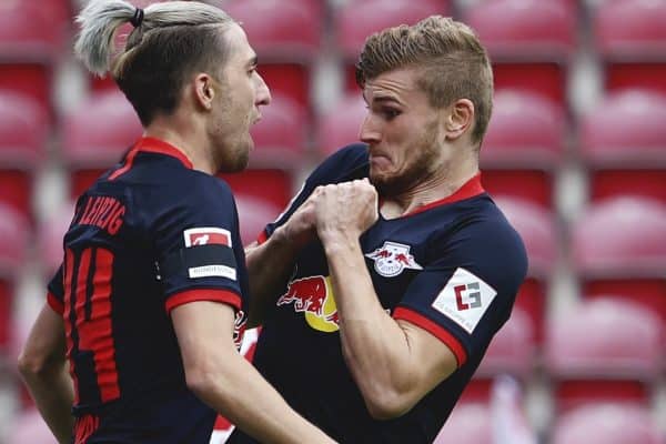 Leipzig's Timo Werner celebrates scoring their fourth goal with Kevin Kampl during a German Bundesliga soccer match between FSV Mainz 05 and RB Leipzig in Mainz, Germany, Sunday, May 24, 2020. (Kai Pfaffenbach/pool via AP)