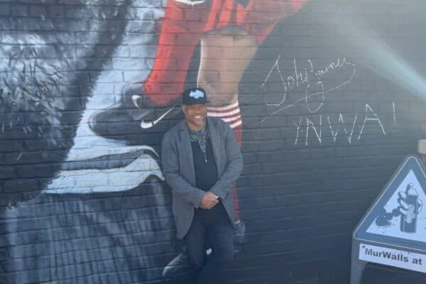 John Barnes stood in front of John Barnes mural, Balfour Street, April 20, 2023