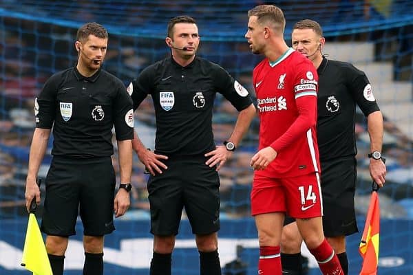 Liverpool's Jordan Henderson speaks to referee Michael Oliver after the Premier League match at Goodison Park, Liverpool.