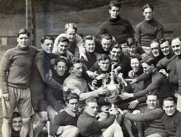 (Please credit within piece: The Wadsworth family) Liverpool's 'Untouchables', back-to-back First Division winners, 1921/22 and 1922/23; Walter Wadsworth in centre, with trophy