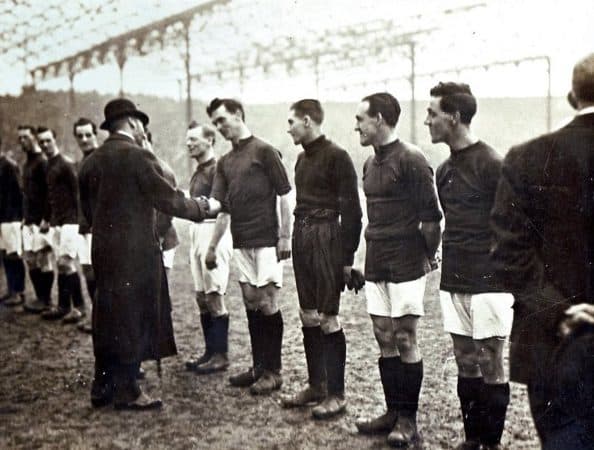 (Please credit within piece: The Wadsworth family) Walter Wadsworth greets King George, Liverpool vs. Manchester City, March 1920