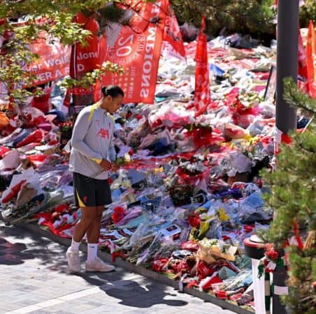 In this handout image provided by Liverpool FC, players of Liverpool Football Club at the memorial of teammate Diogo Jota at Anfield on July 11, 2025 in Liverpool, England. The Liverpool player and Portugal international Diogo Jota, 28, was killed in a car crash on July 03 in Zamora, Spain. He was travelling with his brother Andre Silva before returning to the UK for the start of the Premier League season. (Photo by Liverpool FC - Handout/Liverpool FC via Getty Images)