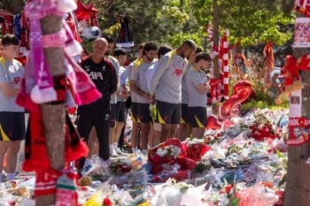 In this handout image provided by Liverpool FC, players of Liverpool Football Club at the memorial of teammate Diogo Jota at Anfield on July 11, 2025 in Liverpool, England. The Liverpool player and Portugal international Diogo Jota, 28, was killed in a car crash on July 03 in Zamora, Spain. He was travelling with his brother Andre Silva before returning to the UK for the start of the Premier League season. (Photo by Liverpool FC – Handout/Liverpool FC via Getty Images)