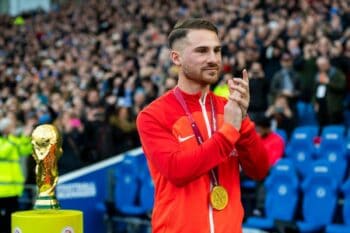 Brighton’s Alexis Mac Allister with World Cup winners medal and replica  cup acknowledges fans before the Brighton v Liverpool game 14th January 2023