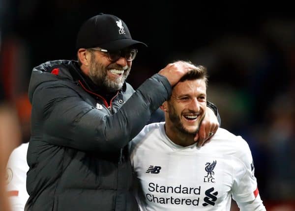 Liverpool manager Jurgen Klopp (left) celebrates with Adam Lallana after the Premier League match at Old Trafford, Manchester. (PA Media)