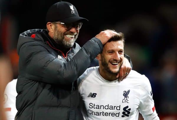 Liverpool manager Jurgen Klopp (left) celebrates with Adam Lallana after the Premier League match at Old Trafford, Manchester. (PA Media)