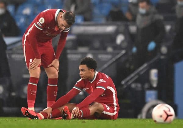 Liverpool's Trent Alexander-Arnold sits on the pitch before being substituted with an injury during the Premier League match at the Etihad Stadium, Manchester.