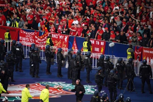 Police stand in front of Liverpool fans during the Champions League final at the Stade de France (Peter Byrne/PA)