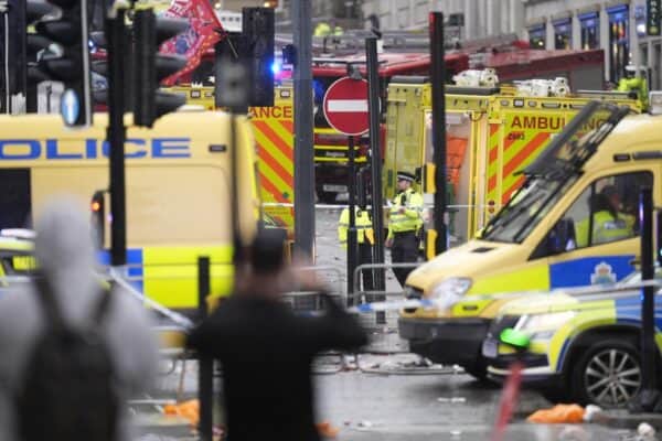 Police and emergency personnel on Monday in Water Street (Danny Lawson/PA)