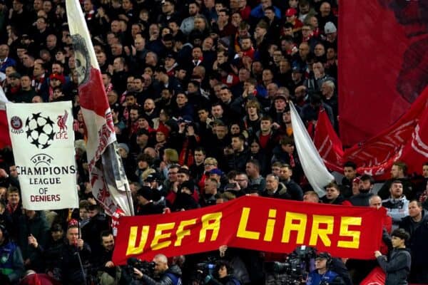 Liverpool fans hold up banners criticising UEFA (Peter Byrne/PA)