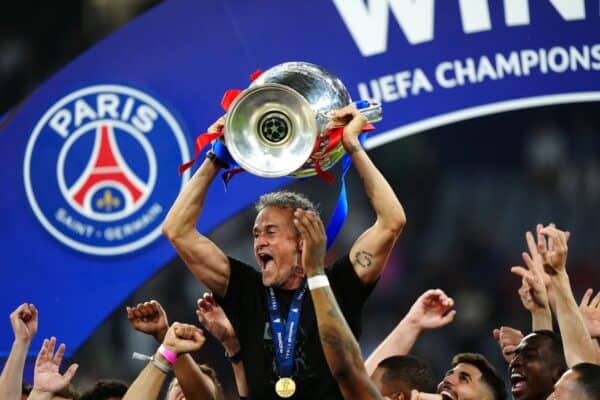 Paris St Germain head coach Luis Enrique lifts the Champions League trophy (Mike Egerton/PA)
