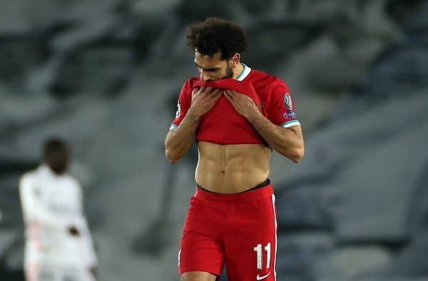 Liverpool's Mohamed Salah appears dejected after Real Madrid's Jose Vinicius Junior (not pictured) scores their side's third goal of the game during the UEFA Champions League match at the Alfredo Di Stefano Stadium, Madrid. Picture date: Tuesday April 6, 2021.