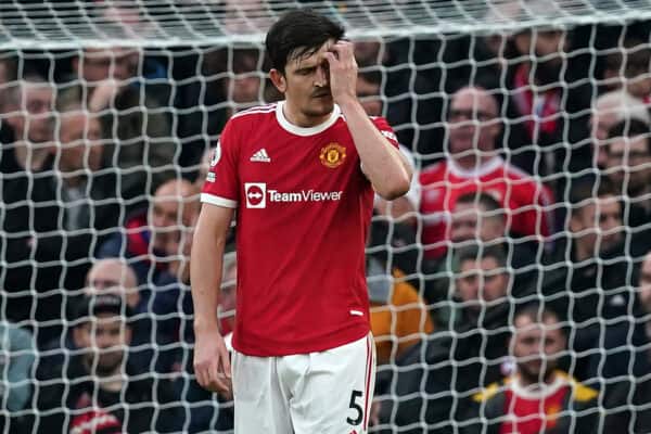 Manchester United's Harry Maguire reacts after Liverpool's Mohamed Salah (not pictured) scores their side's third goal of the game during the Premier League match at Old Trafford, Manchester. Picture date: Sunday October 24, 2021.